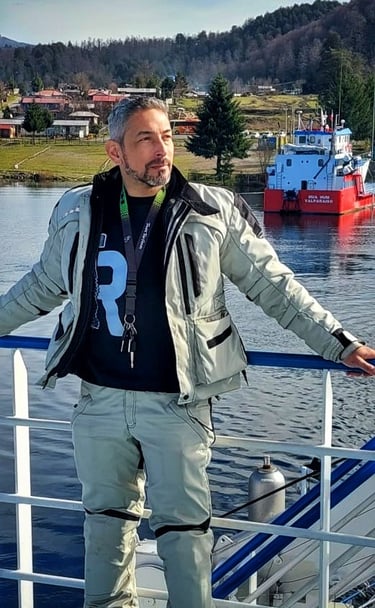 a man standing on a boat in the water